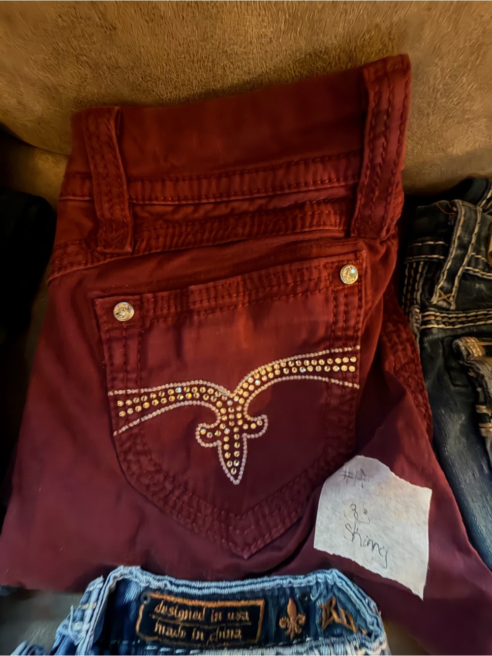 Rock Revival Women’s Burgundy Skinny Jeans with Rhinestone Pocket